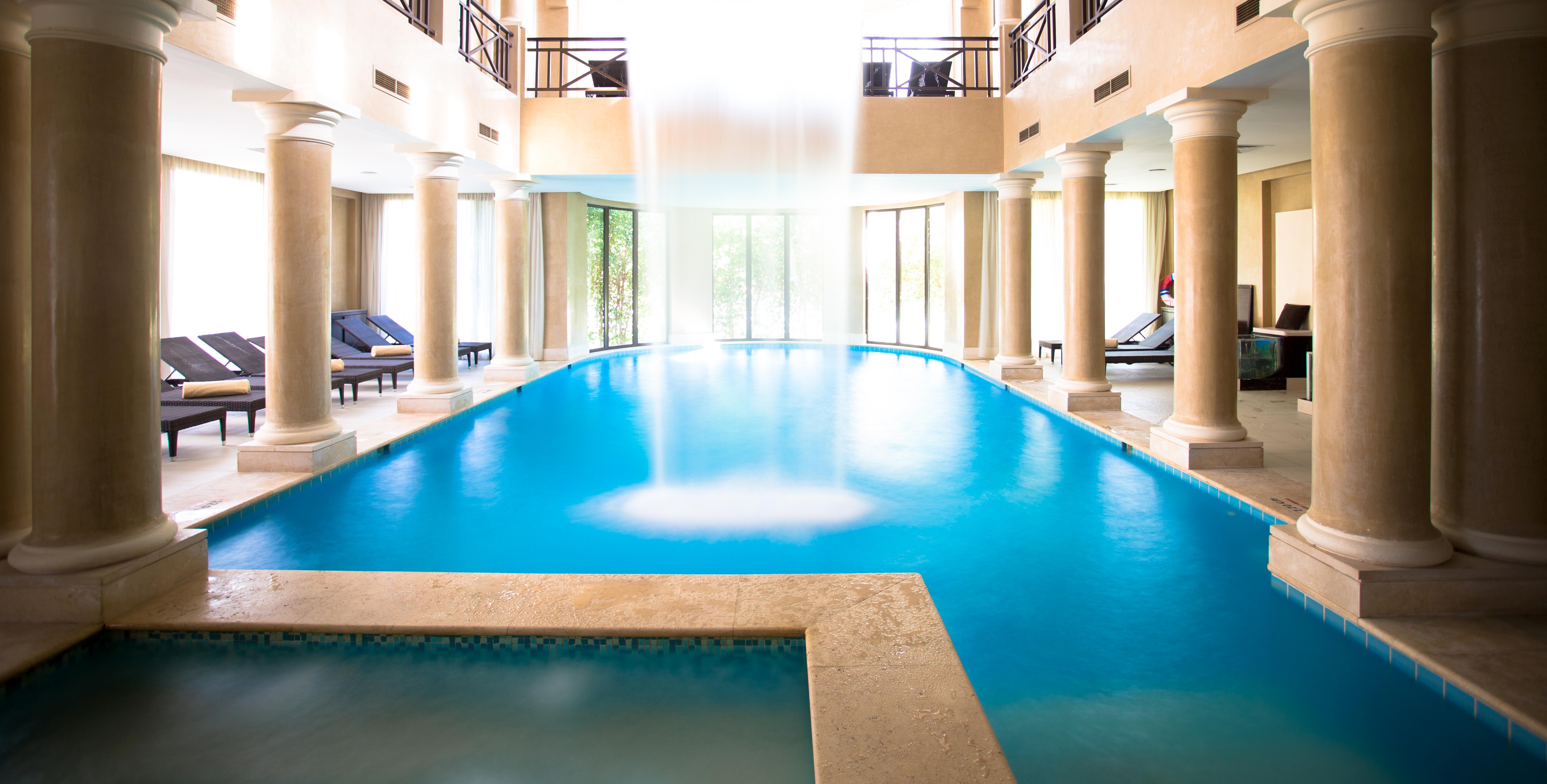 Jaz Aquamarine Hotel Hurghada Exterior foto The swimming pool at the hotel